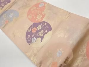 丸文に花葉・雲・流水模様織出し名古屋帯